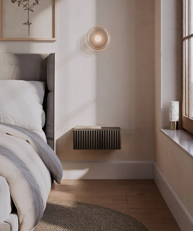 Elegancka szafka nocna wisząca CZARNA z ryflowanym frontem i matowym wykończeniem. Modny design sprawia, że mebel idealnie pasuje do wnętrz nowoczesnych, glamour, japandi oraz skandynawskich.